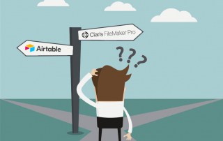 Businessman standing at crossroads, wondering which direction to go - Airtable vs. FileMaker Pro?